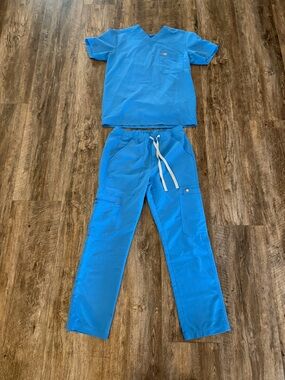 Bright Blue Medical Scrub Set with Pocket Logo